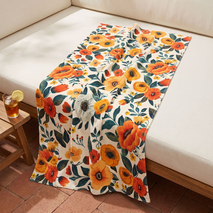 Golden Bloom Harmony beach towel, displayed in a summer setting.