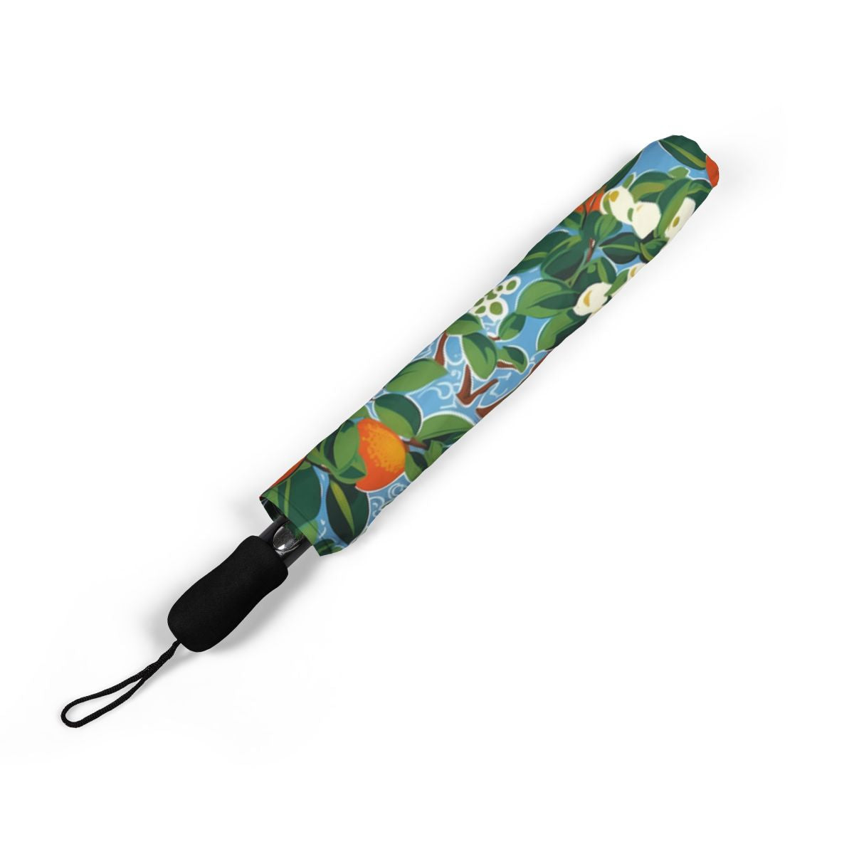 Citrus Blue Bliss umbrella folded closed, showing the printed canopy and wrist strap