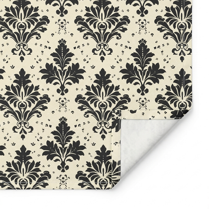 Close-up of Classic Regency cotton twill table runner showing the printed face, hemmed edge, white seam thread, and natural-white unprinted reverse