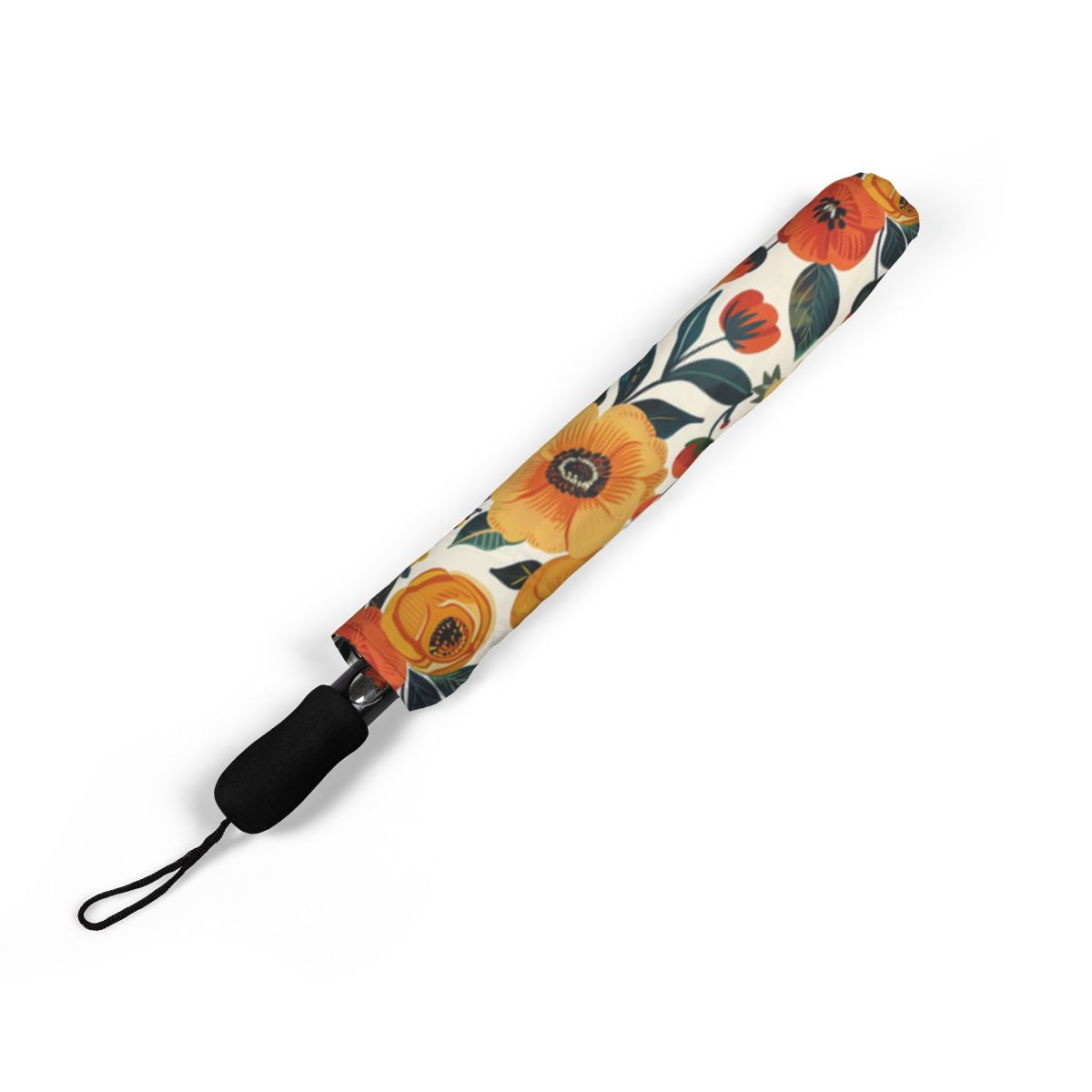 Golden Bloom Harmony umbrella folded closed, showing the printed canopy and wrist strap