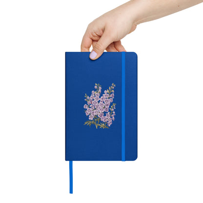 July Birth Month Flower - Larkspur Hardcover Bound Notebook - Celebrate with July's Vibrant Spirit! Available in 4 colors.