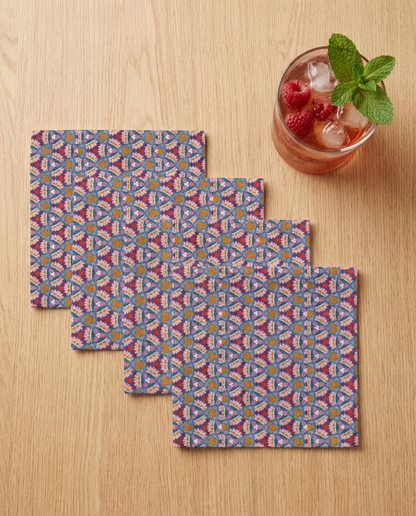 Prismatic Petal Paradise cocktail napkins, set of four, with drink for scale
